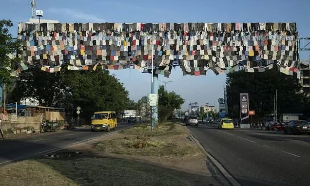 Ghana artist's billboard campaign takes aim at fast fashion fallout