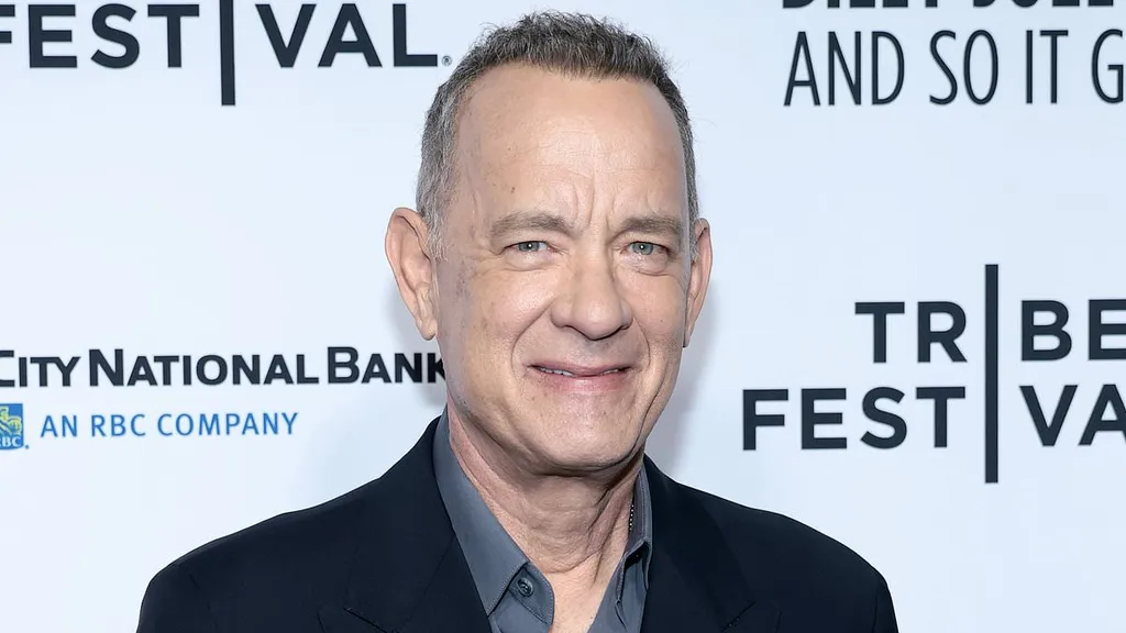 Tom Hanks sways to son Chet Hanks' music as he performs at Stagecoach