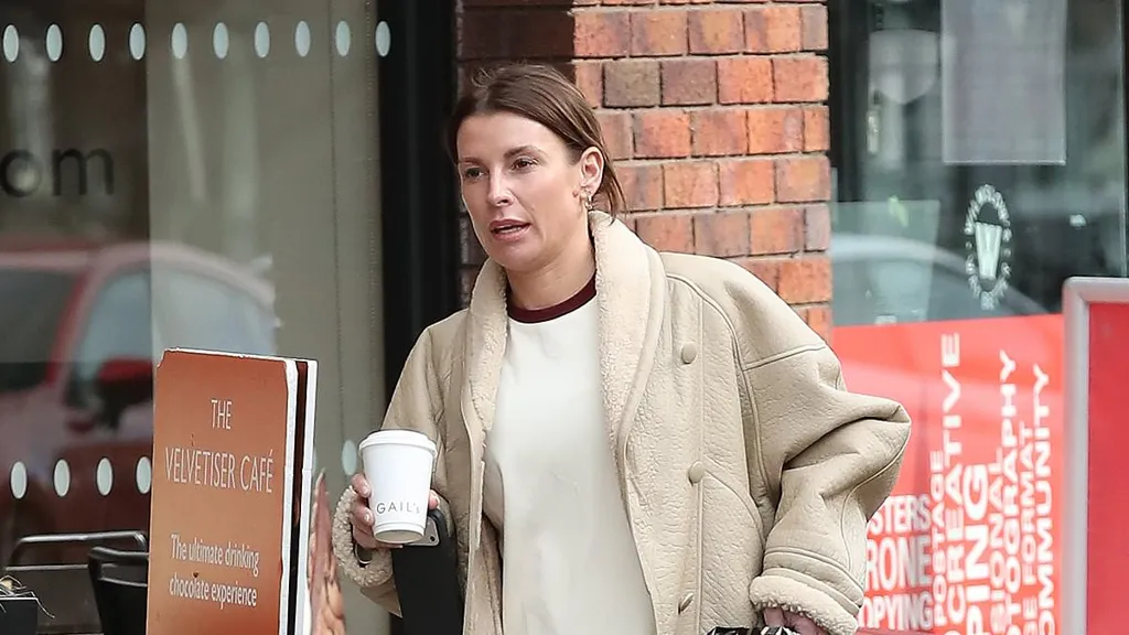 Coleen Rooney runs errands after Wayne 'partied with mystery women'