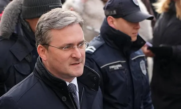 Serbian government official faces forgery trial over withdrawn...