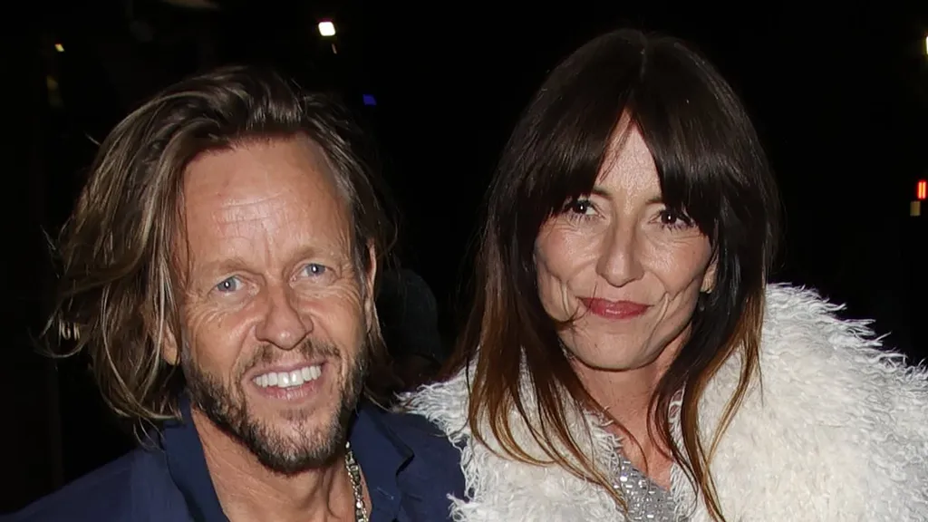 Davina McCall and her husband Michael Douglas leave Broadcast Awards