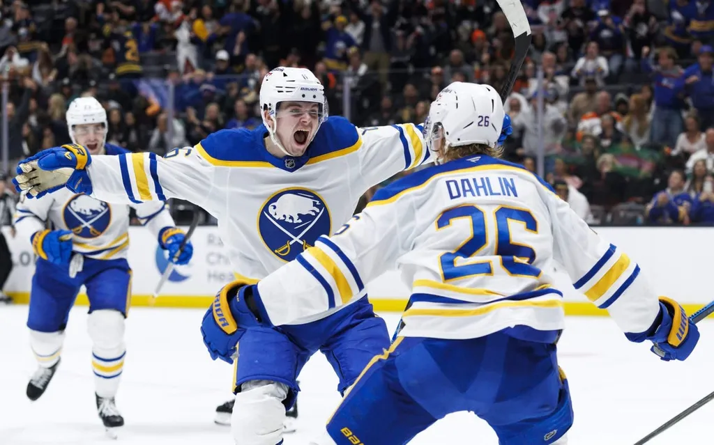 How much did 4 slogans help Sabres get back to NHL playoffs after 15 years?