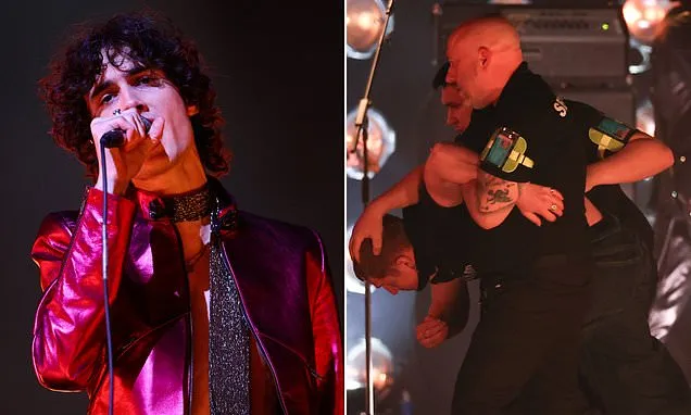 BRIT Awards 'protestor' bundled off stage by security guards