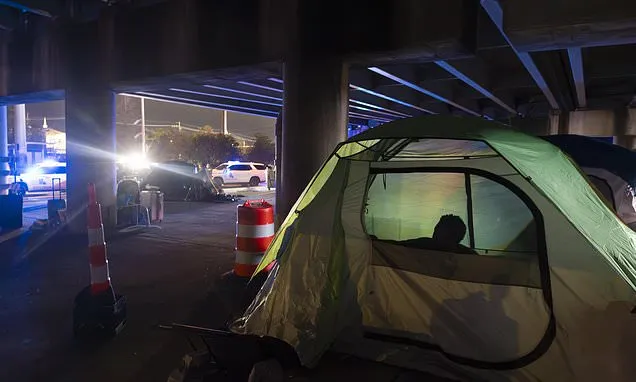 Governor forces out homeless people by New Orleans Superdome before...