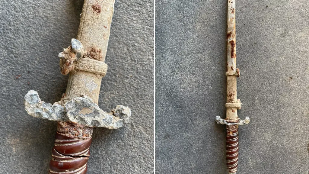 Mom gardening in yard finds buried sword -- then realizes what era it's from