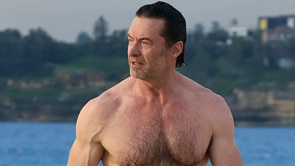 Hugh Jackman, 56, shows off his Wolverine abs at Bondi