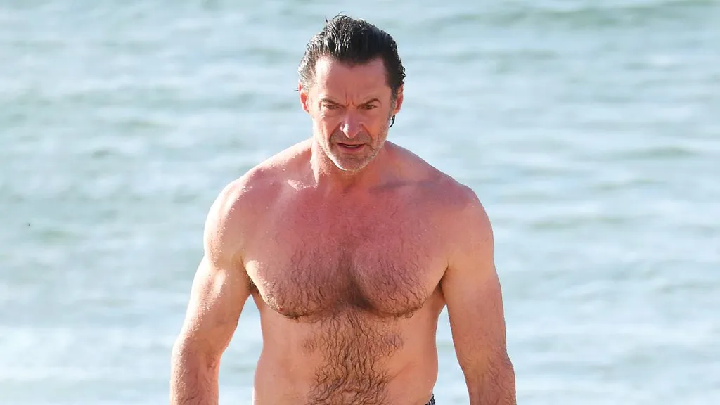 Hugh Jackman goes shirtless while enjoying a swim down North Bondi