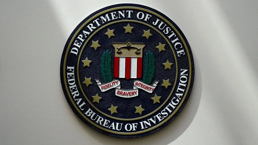Albany man charged with theft of FBI patrol car