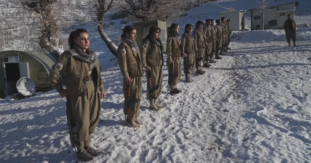 Kurdish Iranian opposition in Iraq ready to take on regime, but says not yet, as Trump steps back from threats