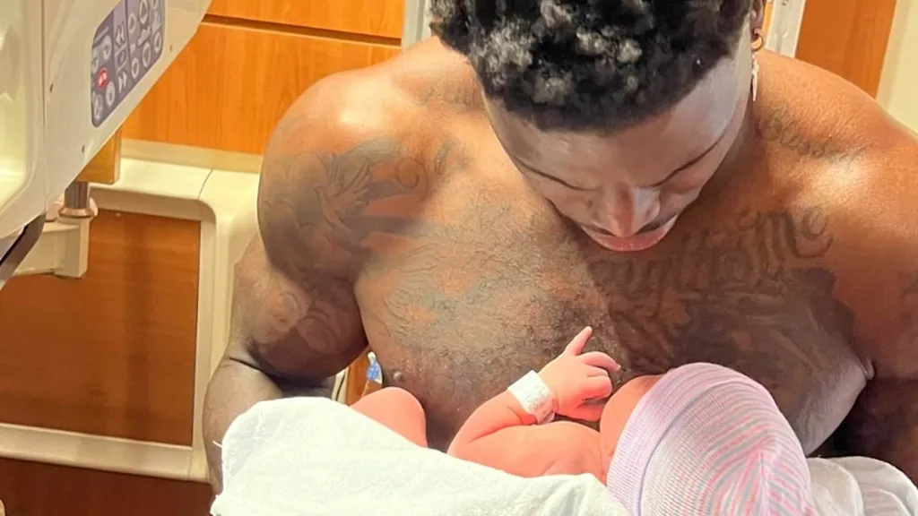 Hill announces birth of latest child... but fans spot bizarre detail