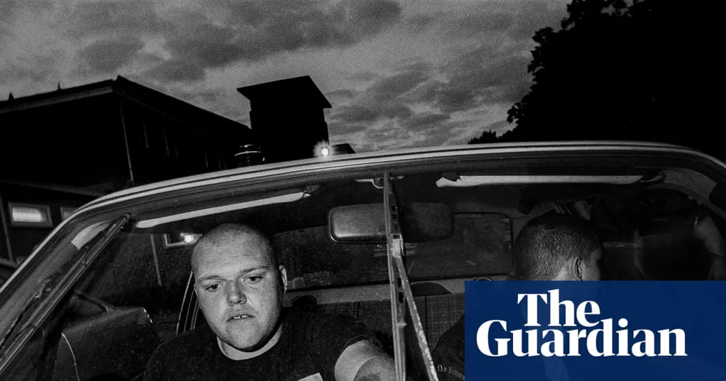 Two skinheads counting the takings from a neo-Nazi gig: Leo Regan's best photograph