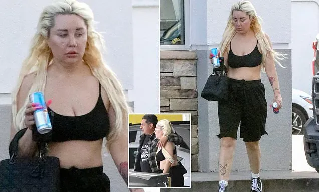 Amanda Bynes looks much slimmer in a bra top after losing 30lbs