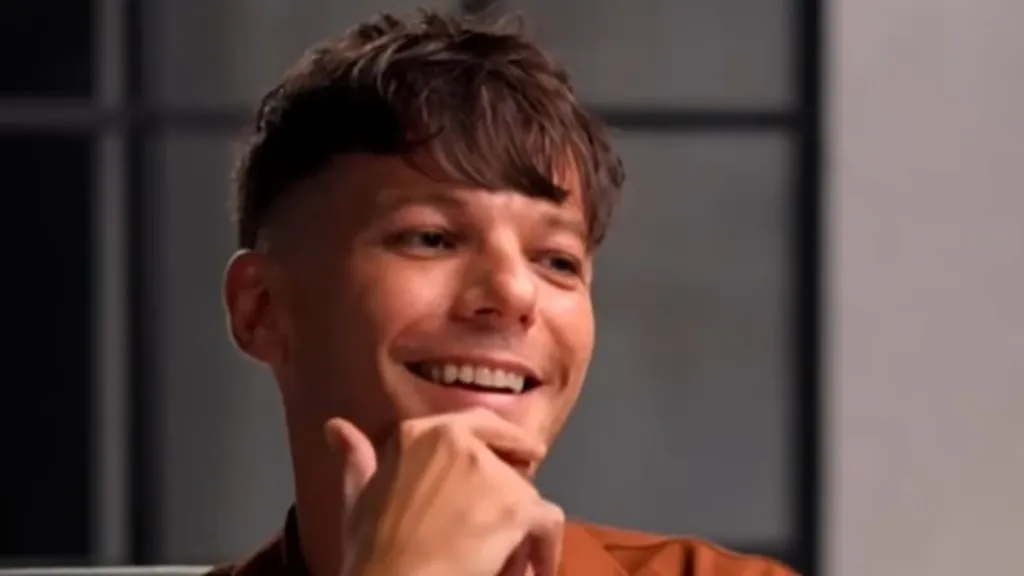 Louis Tomlinson recalls the 'challenges' of becoming a father at 24