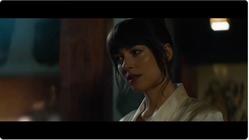 Anne Hathaway and Dakota Johnson share steamy kiss in movie trailer