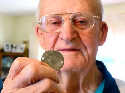 How did a World War II ID tag connect a Sioux City man to family of sailor he never met?