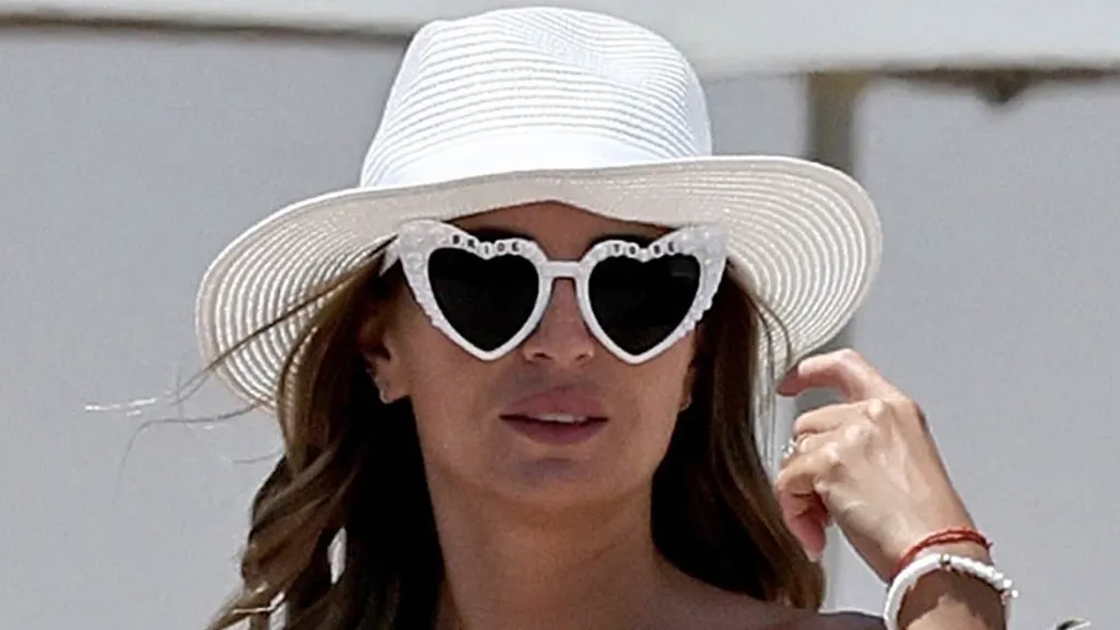 Dani Dyer looks sensational in a white bikini on her hen do