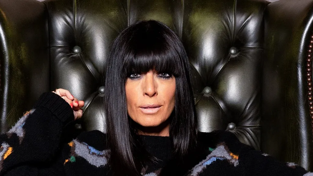 The Traitors' Claudia Winkleman smoulders in tartan and hooded coat