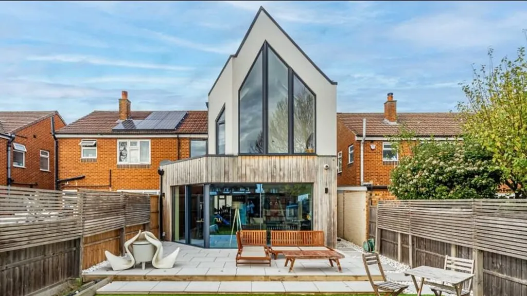 Ex-council house with 'ghastly' pointed extension goes on sale