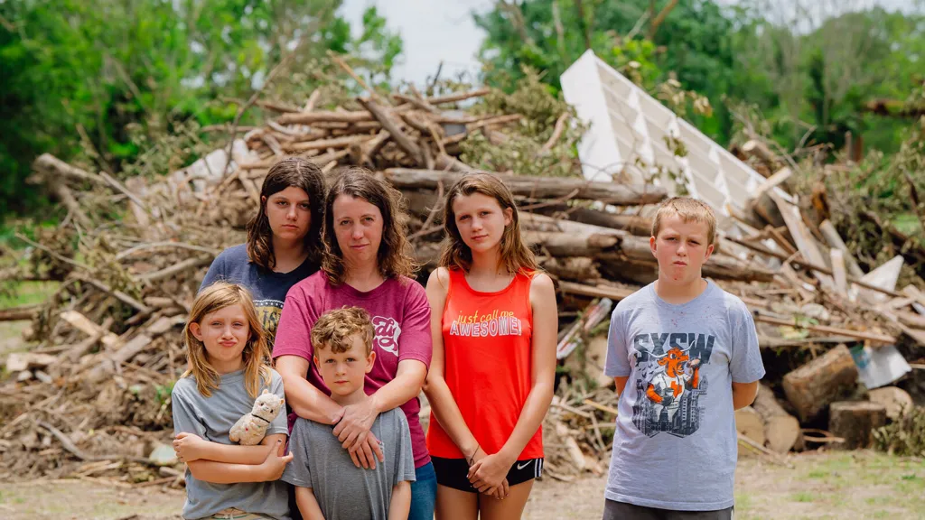 A Mother of Five Survived the Flood to Return to a Cabin in Ruins