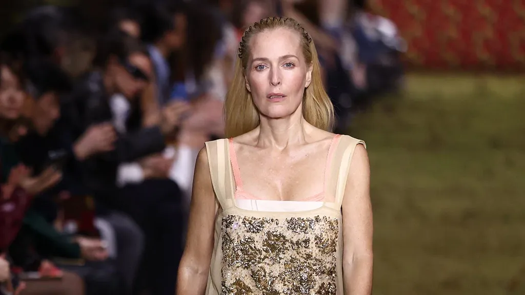 Gillian Anderson, 57, walks in Miu Miu Paris Fashion Week catwalk show