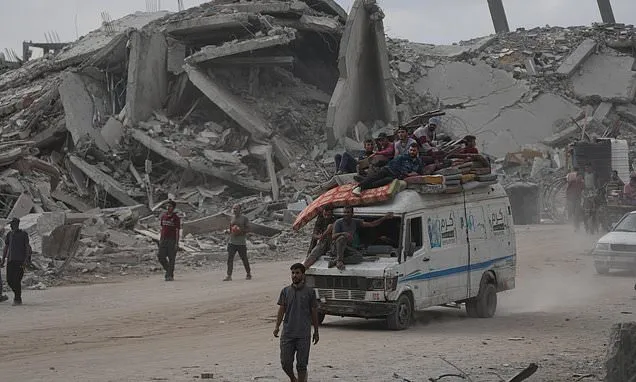 The Latest: Palestinians journey back home as aid convoys start to...