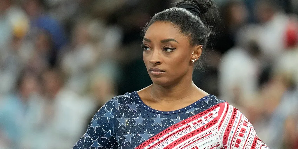 Olympian Simone Biles faces fierce backlash after clash with Riley Gaines over trans athletes debate