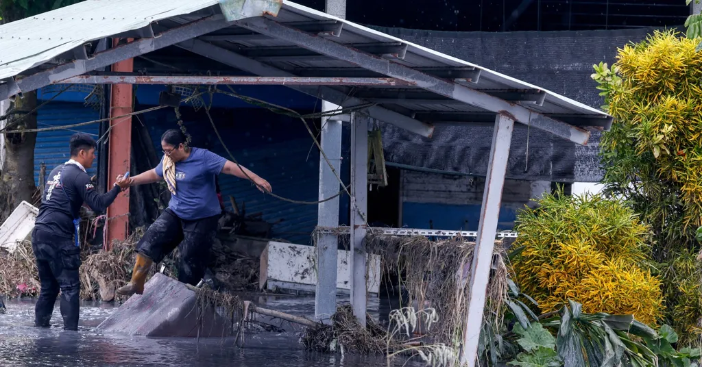 Taiwan rescuers battle thick mud to look for missing from Super Typhoon Ragasa