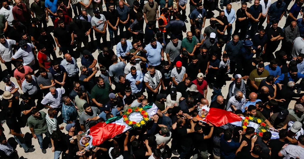 Funeral held for Palestinian-American killed in West Bank as Gaza ceasefire talks drag on