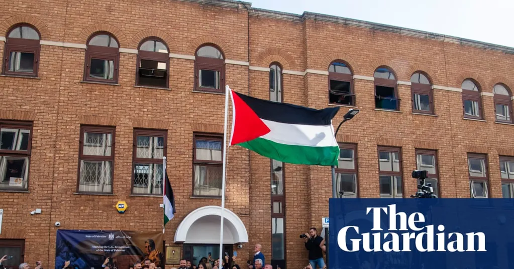A glut of VIPs and a heckled minister see Palestinian flag raised at London's newest embassy