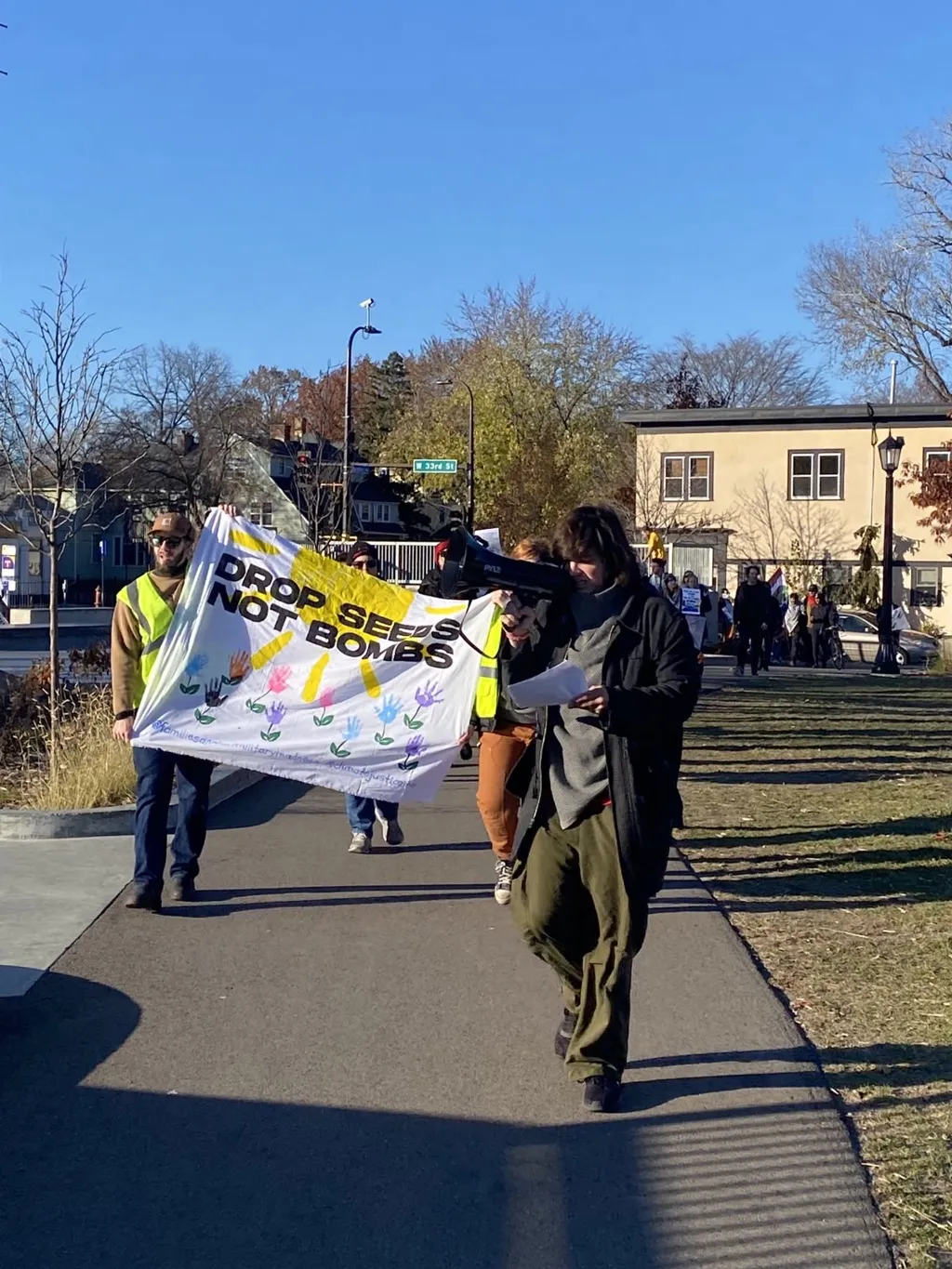 Minneapolis families continue the fight: 'Money for climate, not for war!'