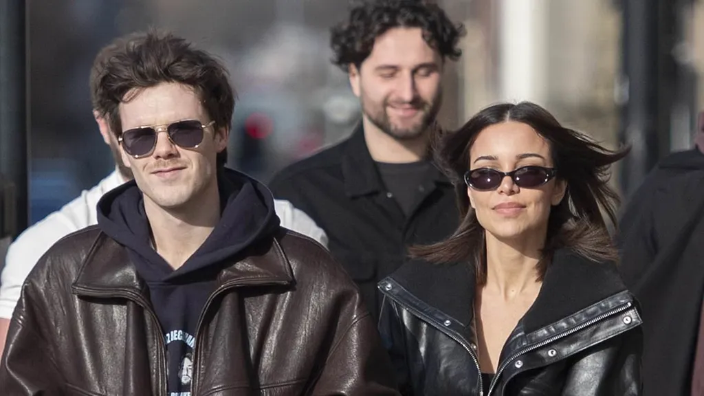 Cruz Beckham walks arm-in-arm with Jackie Apostel in Glasgow