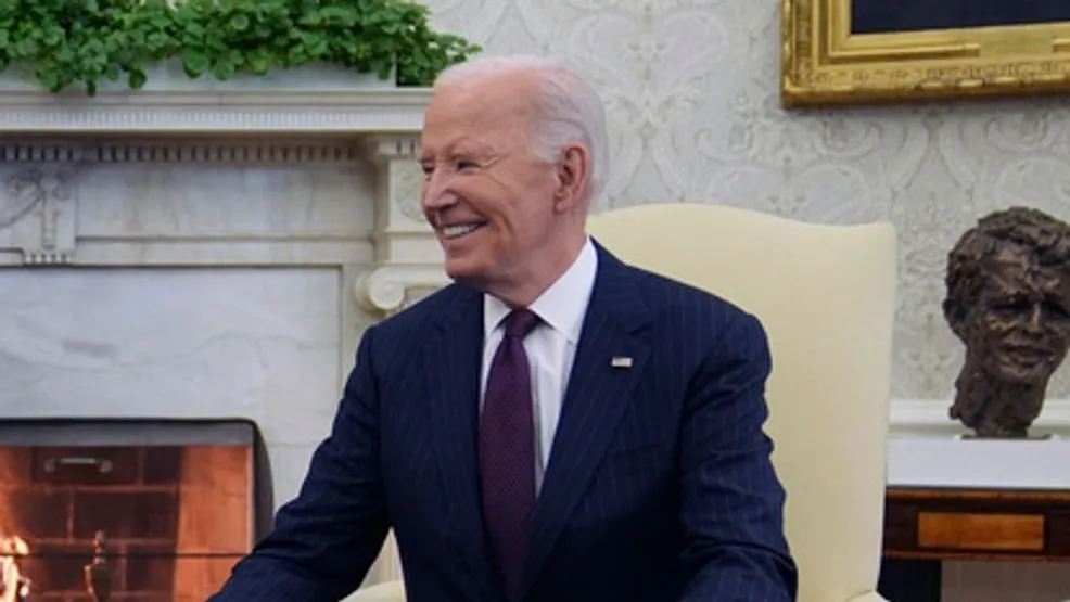 Biden asks reporter if she 'can keep from getting hit' in head by news camera