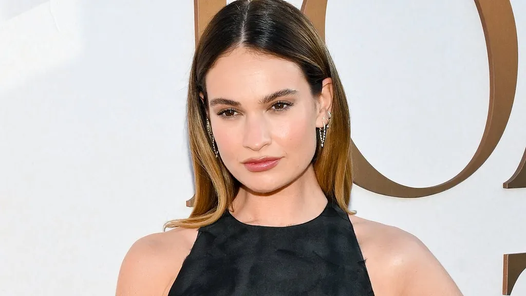 Lily James flashes a rare glimpse of her tattoos at a Disney event