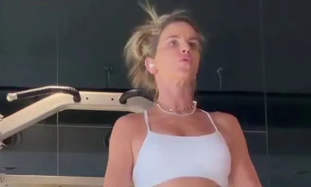 Pregnant Vogue Williams shows off her bump in a crop top