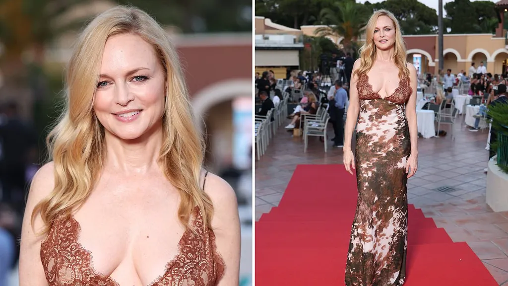 Braless Heather Graham, 55, sizzles in risque gown