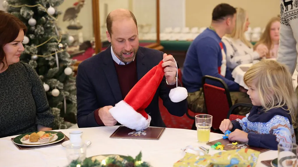 Prince Harry dons a Santa hat as he joins a virtual Christmas party