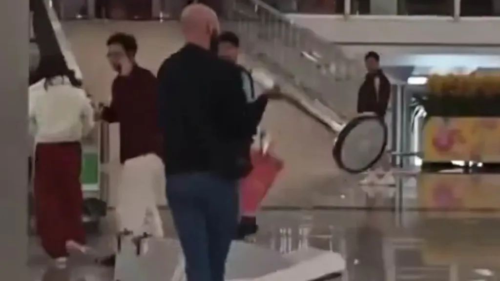 Brit loses control at airport using metal post to smash check-in desks